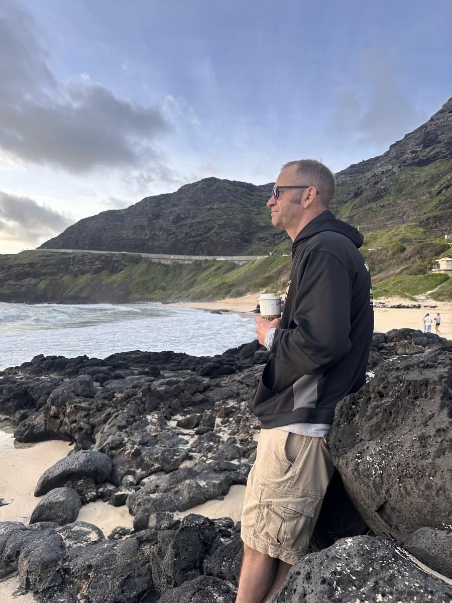 Damon overlooking the ocean in Hawaii